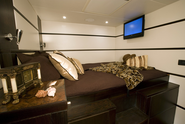 M2 60 guest cabin with dark wood cabinetry