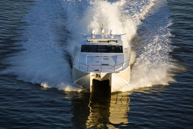 M2 60 motor yacht running directly toward the camera